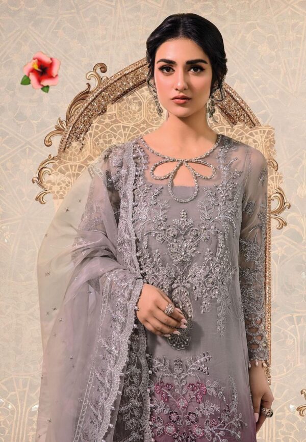 Fabric organza suit with malai crap trouser