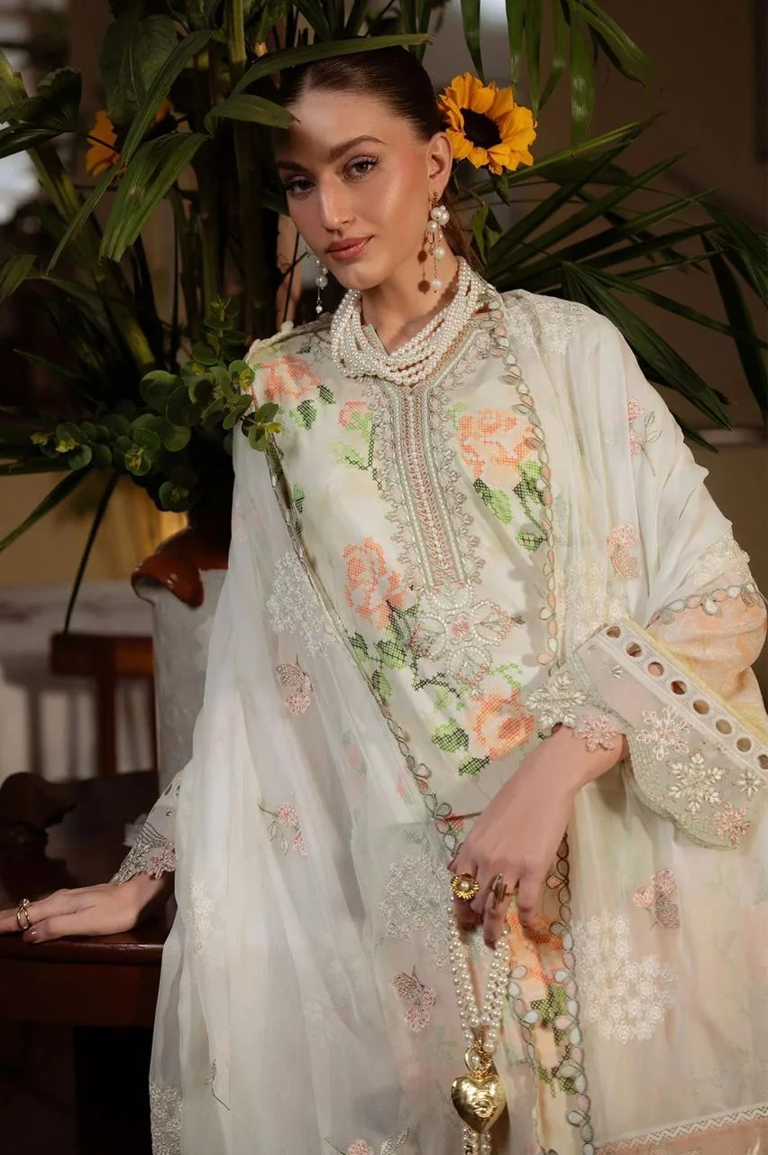 Nureh brand luxury unstitched 3 piece lawn suit with heavy pallu dupatta - oye ji Nureh brand ivory embroidered suit luxury model leaning pose premium lifestyle shot oye ji