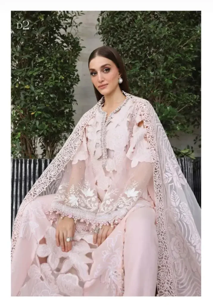 maria b outfits pastel baby pink luxury embroidered lawn suit sitting pose